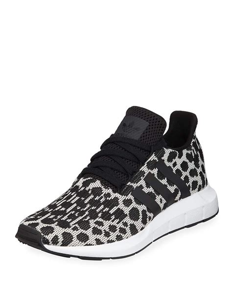 adidas black cheetah print shoes.